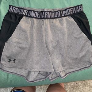 Black and grey UA shorts with pockets